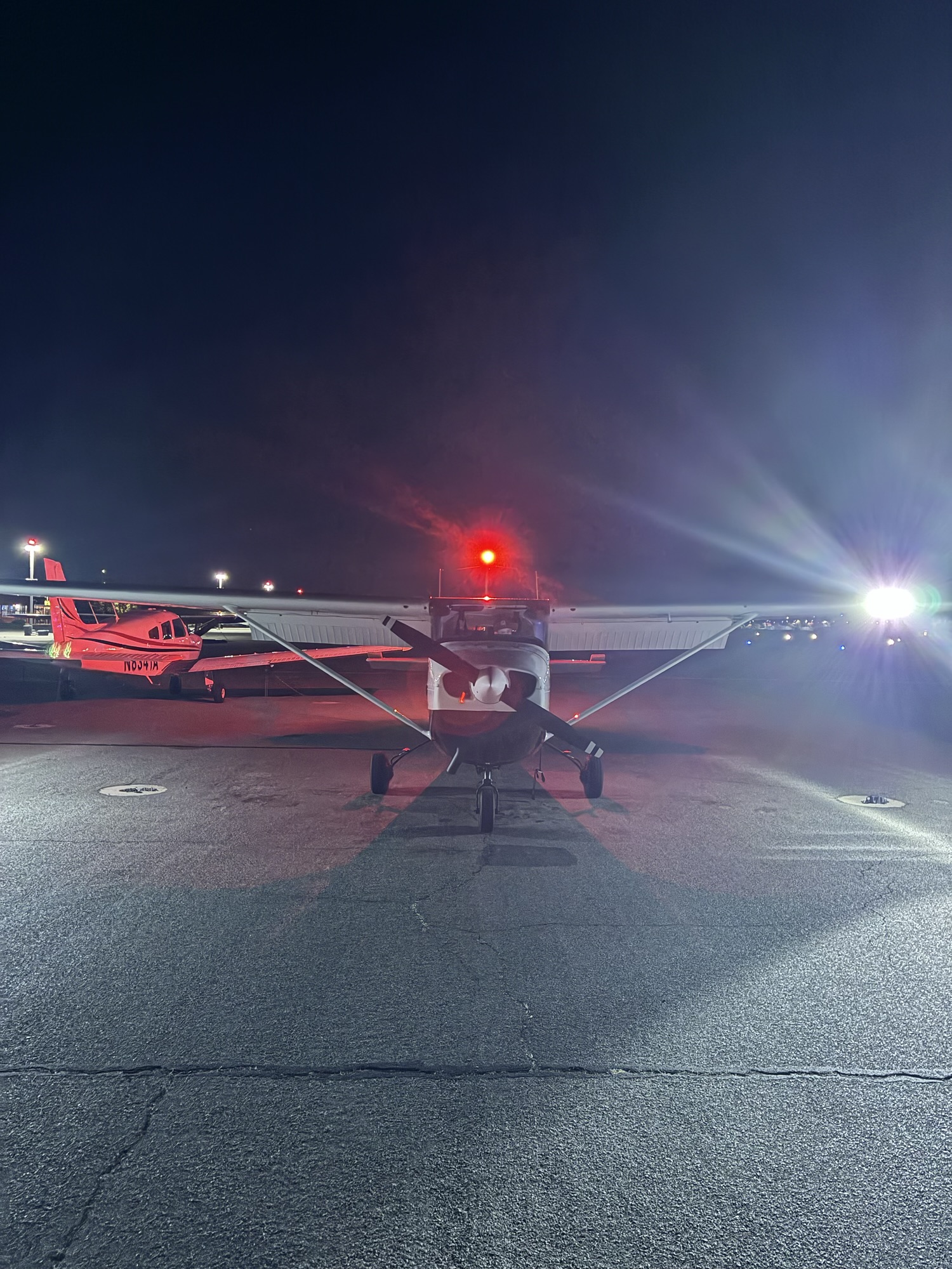 Aircraft on ramp at night at French Valley Airport